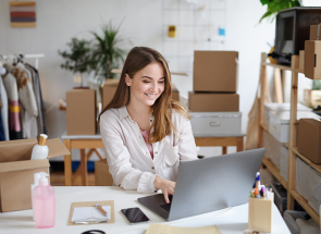 young-woman-dropshipper-with-laptop-working-at-hom-WEVGR76.png